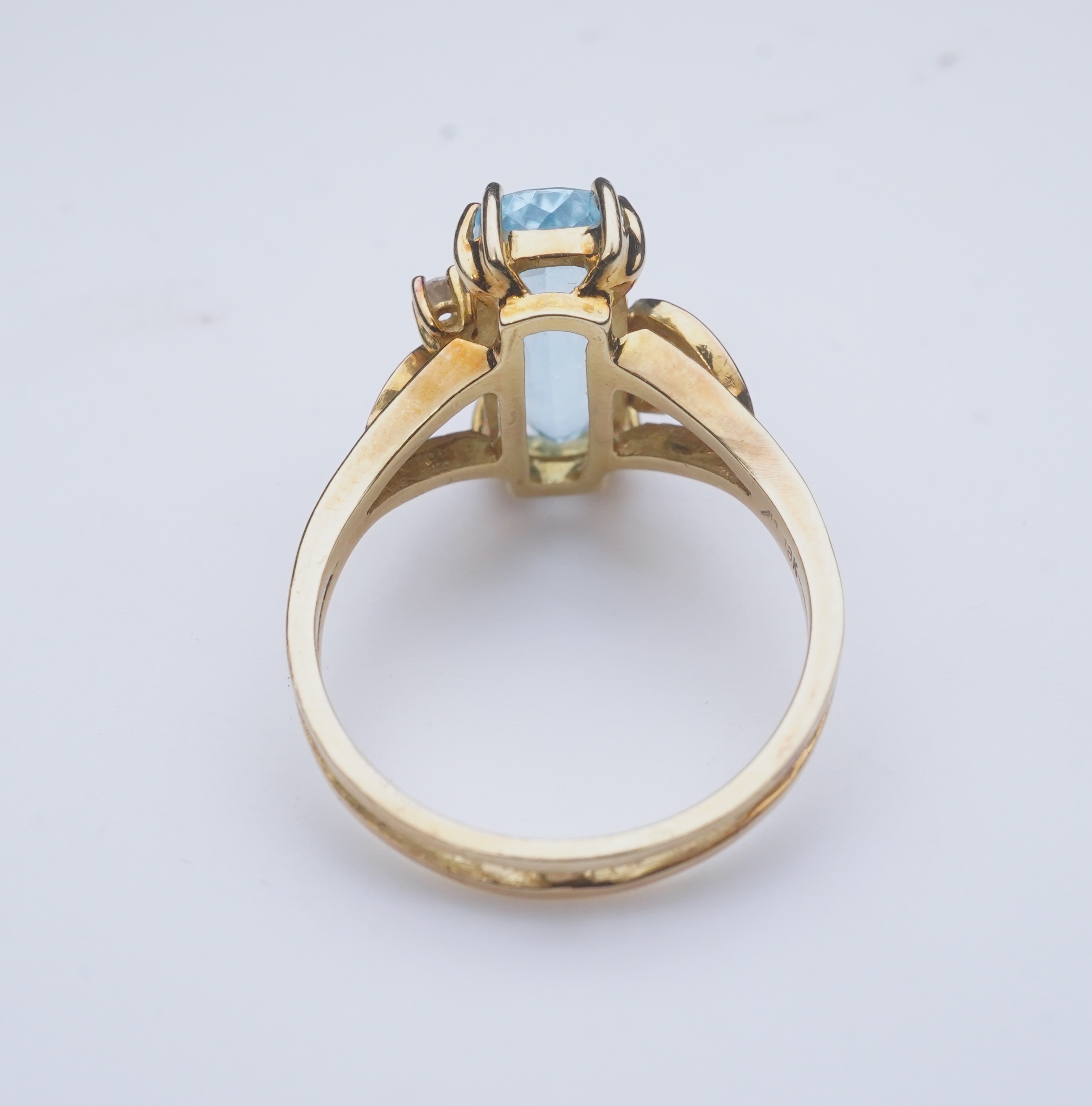 An aquamarine and diamond ring